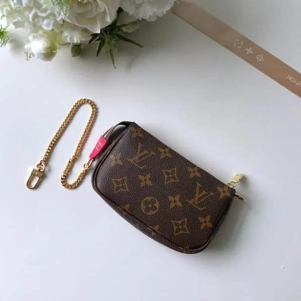 Christmas Mini Pochette Accessoires In Monogram Canvas M67769 2018